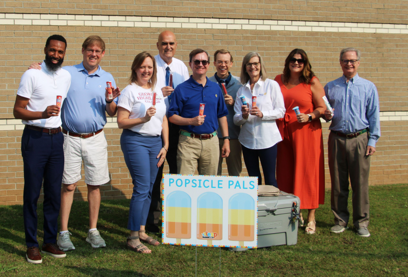 Rotarians distribute ice cream at ESP camp